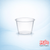 A stack of clear 2oz compostable PLA portion pots for sauces and dressings Ireland