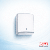 A slim white Jofel Z-fold hand towel dispenser and a stack of 2-ply soft white interfold towels Ireland